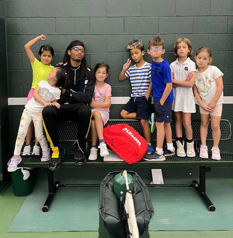 Osiris coaching tennis.